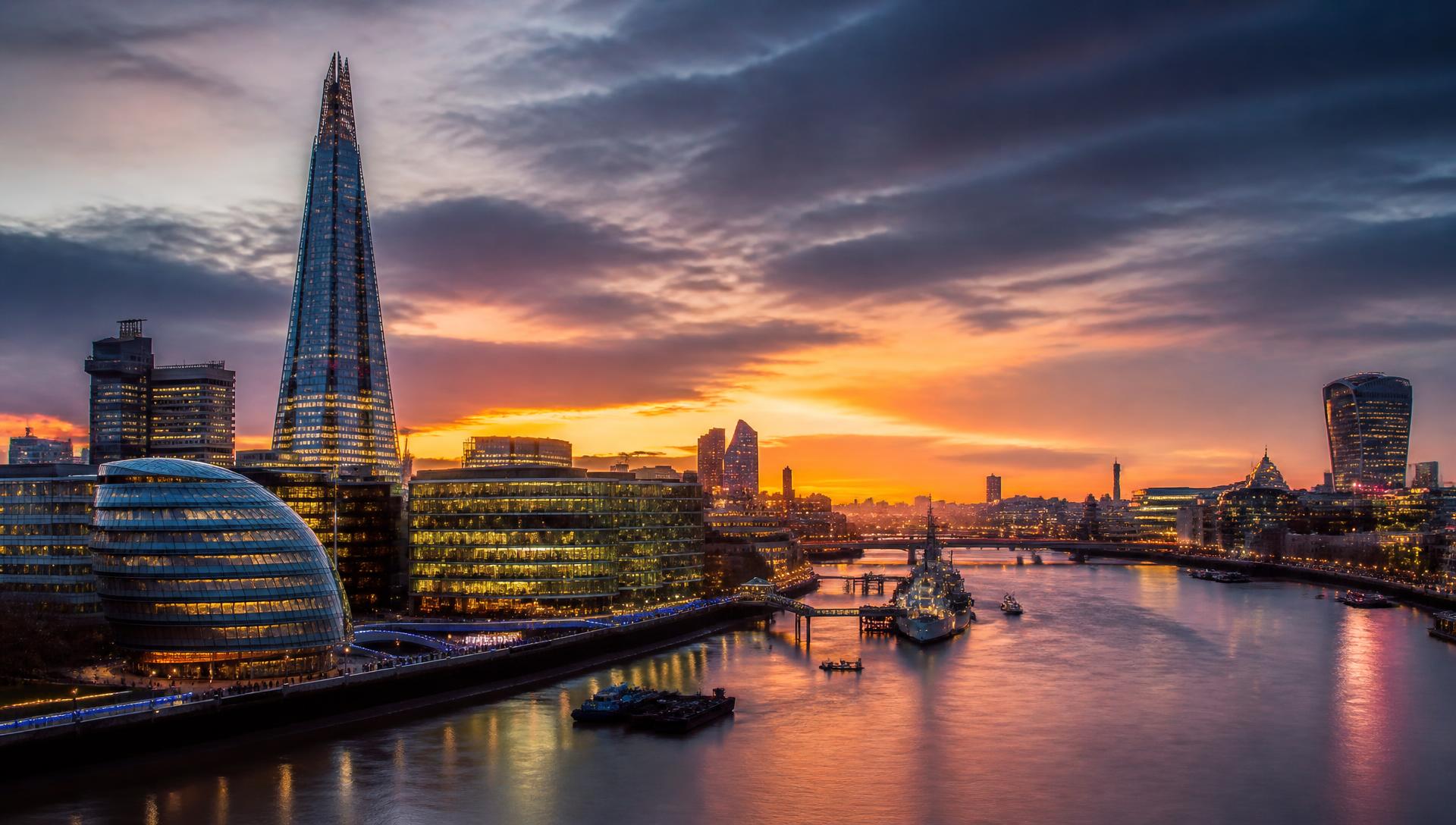 London skyline at dusk with The Shard along the Thames